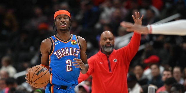 Thunder guard Shai Gilgeous-Alexander dribbles up the court during the first half against the Washington Wizards on Nov. 16, 2022.