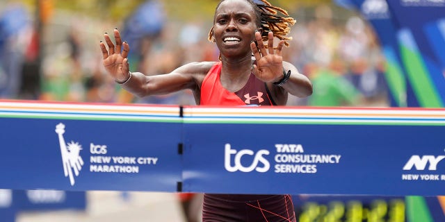 Sharon Lokedi of Kenya crosses the finish line first in the women's division of the New York City Marathon, Nov. 6, 2022, in New York.