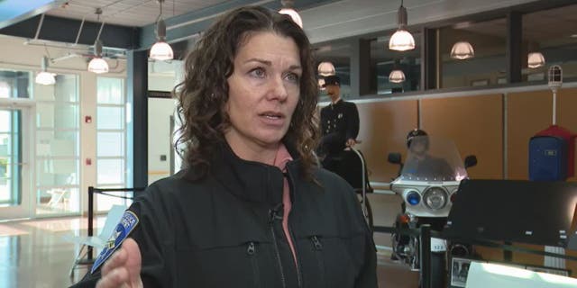 Officer Shelbie Boyd speaks to reporters about the arrest of Paul Snider for the alleged murder of two people