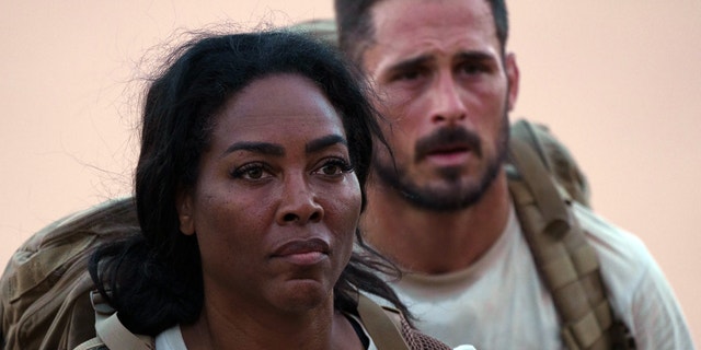 "Real Housewives" star Kenya Moore and NFL player Danny Amendola run through the desert in "Special Force: The Ultimate Test."