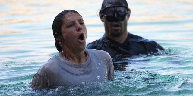 World Cup winner and Olympian, Carli Lloyd, catches her breath during one particularly challenging water test.