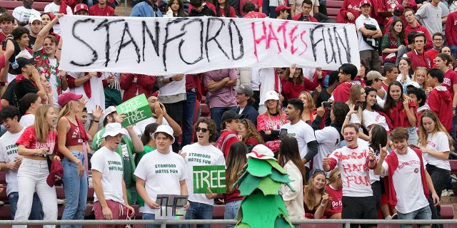 Nov 5, 2022; Stanford, California, USA; Stanford Cardinal fans hold up a sign during halftime against the Washington State Cougars at Stanford Stadium.