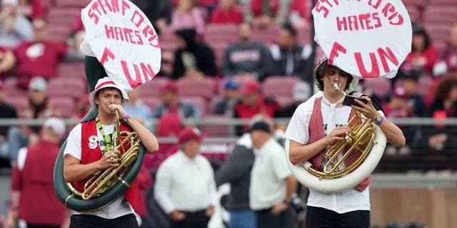 Nov 5, 2022; Stanford, California, USA; Stanford Cardinal marching band tuba players display a message on their instruments before the game against the Washington State Cougars at Stanford Stadium.