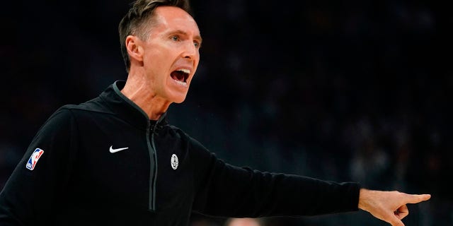 Brooklyn Nets head coach Steve Nash argues a call during the first half of an NBA basketball game Wednesday, Oct. 26, 2022, in Milwaukee. 