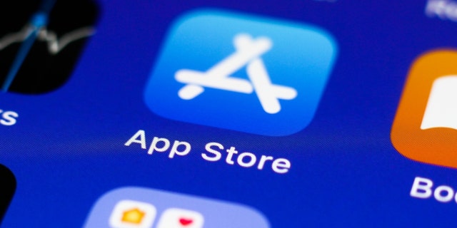 This illustration photo taken in Krakow, Poland on July 18, 2021 shows the App Store icon displayed on a mobile phone screen.