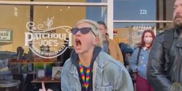 Protester screaming outside of a bookstore in Denton, TX.
