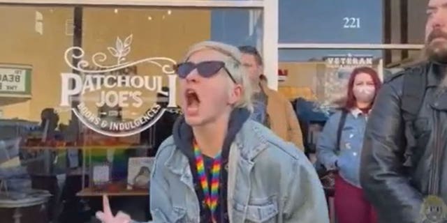 Protester screaming outside of a bookstore in Denton, TX.