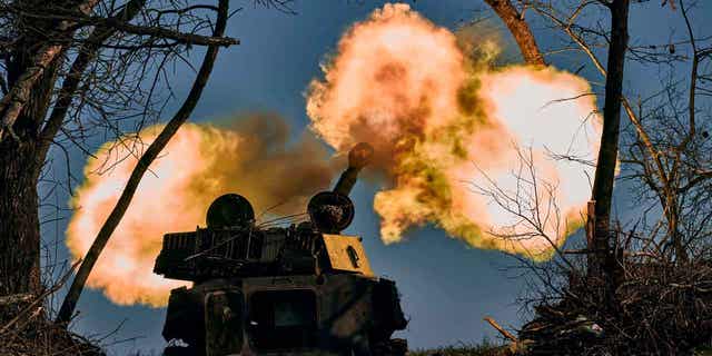 A self-propelled artillery vehicle fires near Bakhmut, Donetsk region, Ukraine on November 9, 2022.