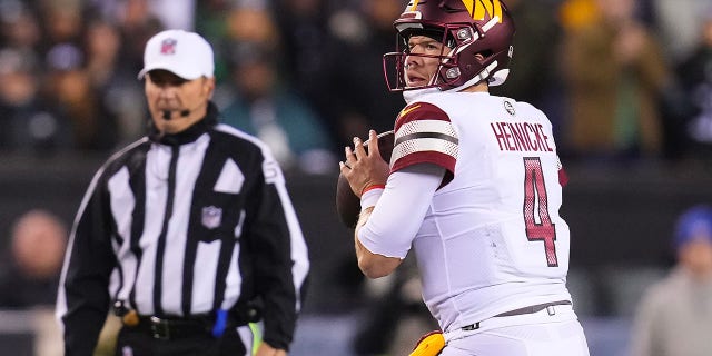 Taylor Heinicke #4 of the Washington Commanders looks to pass the ball against the Philadelphia Eagles at Lincoln Financial Field on November 14, 2022 in Philadelphia, Pennsylvania.