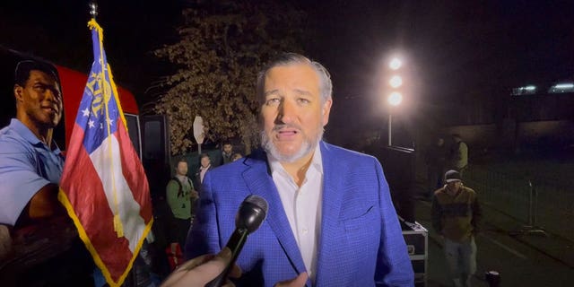 Republican Texas Sen. Ted Cruz speaks with WHD News Digital following a rally with Republican Georgia Senate nominee Herschel Walker and Republican South Carolina Sen. Lindsey Graham in Powder Springs, Georgia on Nov. 22, 2022.