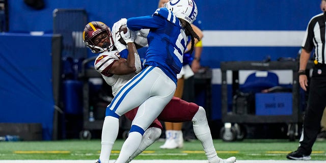 Washington Commanders wide receiver Terry McLaurin makes a catch over Colts cornerback Stephon Gilmore in Indianapolis, Sunday, Oct. 30, 2022.