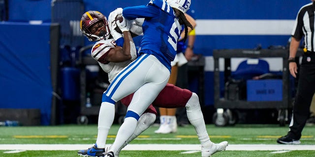 Washington Commanders wide receiver Terry McLaurin makes a catch over Colts cornerback Stephon Gilmore in Indianapolis, Sunday, Oct. 30, 2022.