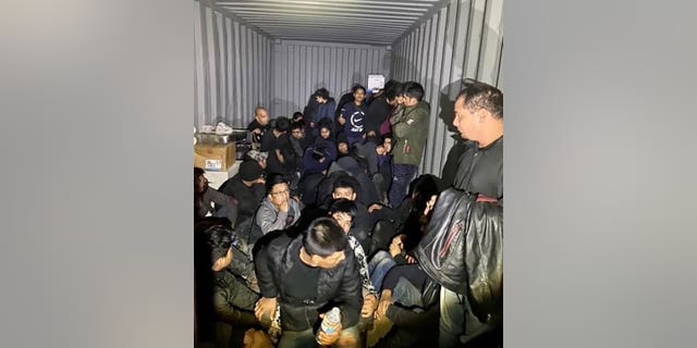 illegal immigrants in Texas tractor trailer