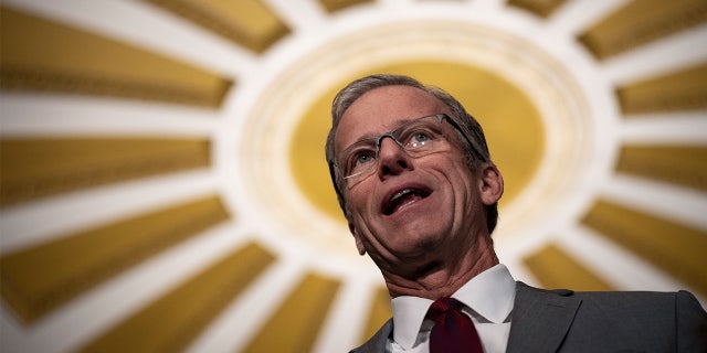 Sen. John Thune (R-SD) speaks to reporters after meeting with Senate Republicans at the U.S. Capitol Nov. 29, 2022, in Washington, D.C.