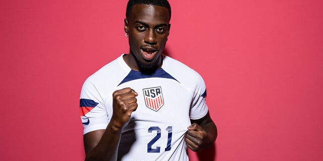 Timothy Weah of United States poses during the official FIFA World Cup Qatar 2022 portrait session at  on November 15, 2022 in Doha, Qatar.