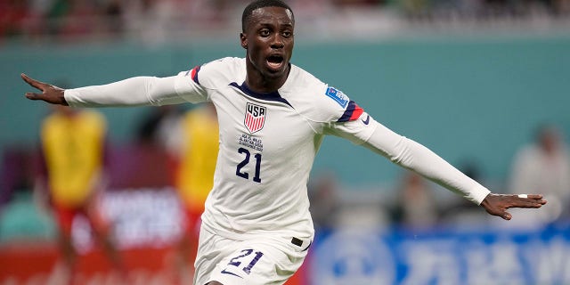 Tim Weah, of the United States, celebrates after scoring during a World Cup Group B soccer match against Wales at the Ahmad Bin Ali Stadium in Doha, Qatar, Monday, Nov. 21, 2022.
