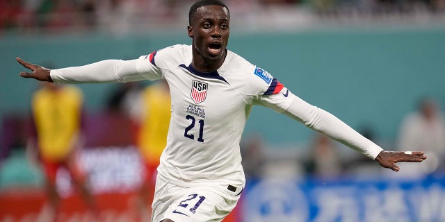 Tim Weah of the United States celebrates after scoring during a World Cup Group B soccer match against Wales at the Ahmad Bin Ali Stadium in Doha, Qatar, Monday, November 21, 2022. 