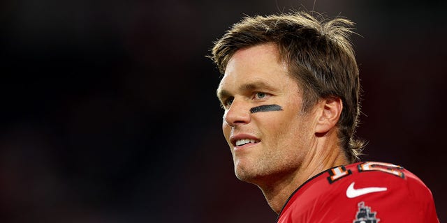 TAMPA, FLORIDA - OCTOBER 27: Tom Brady #12 of the Tampa Bay Buccaneers looks on during pregame warm-ups prior to a game against the Baltimore Ravens at Raymond James Stadium on October 27, 2022 in Tampa, Florida.