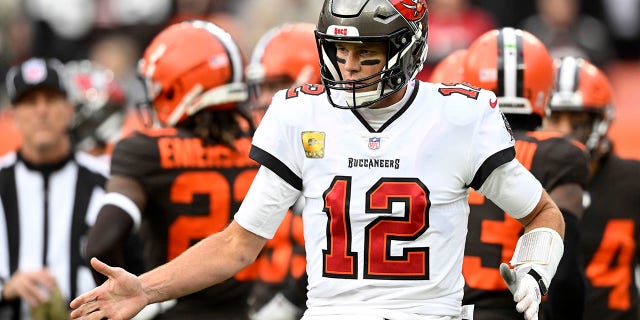 Tampa Bay Buccaneers quarterback Tom Brady celebrates a touchdown pass to wide receiver Chris Godwin on Sunday, November 27, 2022 in Cleveland.