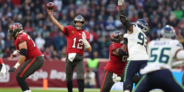 Tampa Bay Buccaneers quarterback Tom Brady throws during the Seattle Seahawks game, Sunday, Nov. 13, 2022, in Munich.