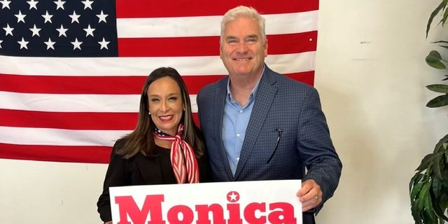 Rep. Tom Emmer of Minnesota, the chair of the National Republican Congressional Committee, teams up with GOP congressional nominee Monica De La Cruz of Texas, at her campaign headquarters in McAllen, Texas, on Oct. 18, 2022