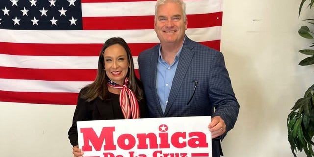 Rep. Tom Emmer of Minnesota, the chair of the National Republican Congressional Committee, teams up with GOP congressional nominee Monica De La Cruz of Texas, at her campaign headquarters in McAllen, Texas, on Oct. 18, 2022