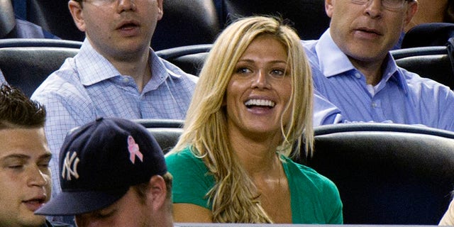 Torrie Wilson, actress and former professional wrestler, watches the New York Yankees play the Kansas City Royals in their MLB American League baseball game at Yankee Stadium in New York, May 22, 2012. 