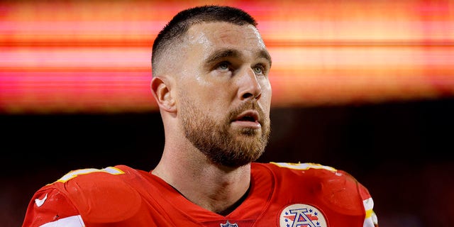 Travis Kelce #87 of the Kansas City Chiefs stands on the sidelines during their game against the Tennessee Titans in the second half at Arrowhead Stadium on November 06, 2022 in Kansas City, Missouri.