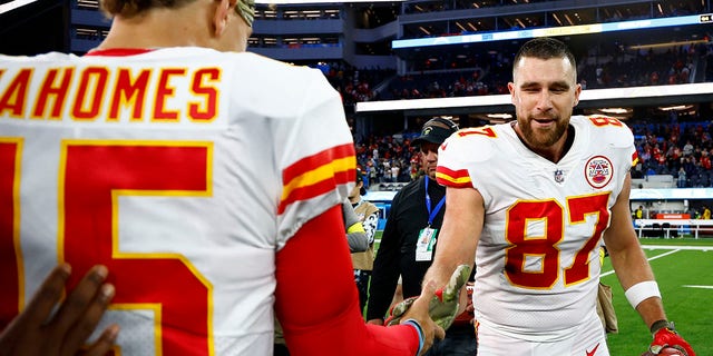 Patrick Mahomes, #15, and Travis Kelce, #87 of the Kansas City Chiefs, celebrate a win over the Los Angles Chargers at SoFi Stadium on Nov. 20, 2022 in Inglewood, California.