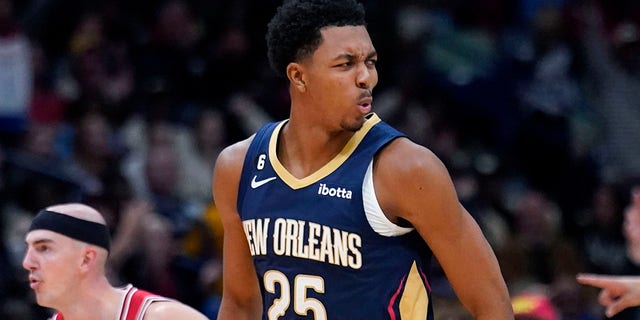 New Orleans Pelicans guard Trey Murphy III, #25, reacts after making a slam dunk in the first half of an NBA basketball game against the Chicago Bulls in New Orleans, Wednesday, Nov.  16, 2022.