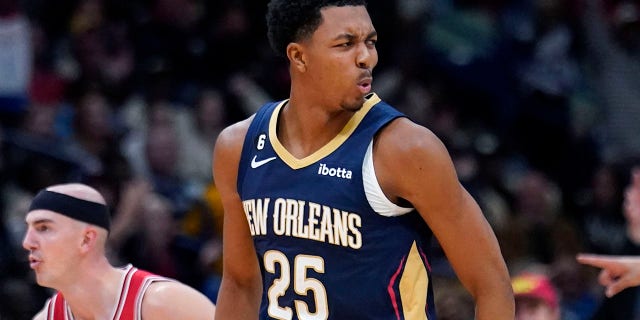 New Orleans Pelicans guard Trey Murphy III, #25, reacts after making a slam dunk in the first half of an NBA basketball game against the Chicago Bulls in New Orleans, Wednesday, Nov. 16, 2022.