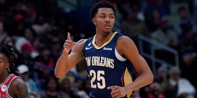 New Orleans Pelicans guard Trey Murphy III, #25, reacts after he made a slam dunk in the first half of an NBA basketball game against the Chicago Bulls in New Orleans, Wednesday, Nov. 16, 2022.