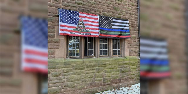 A school official at Trinity College physically took down two students' American flags from outside their dorm while allowing other flags, such as the LGBT and trans flags, to remain up.