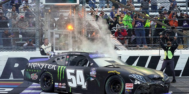Ty Gibbs celebrates after winning the NASCAR Xfinity series auto race at Martinsville Speedway, Saturday, Oct. 29, 2022, in Martinsville, Virginia. 
