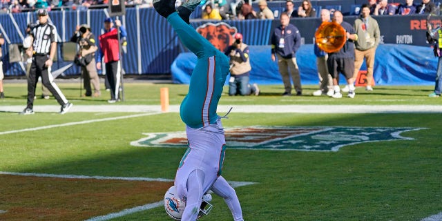 Miami Dolphins wide receiver Tyreek Hill celebrates a touchdown during the first half against the Chicago Bears, Nov. 6, 2022, in Chicago.