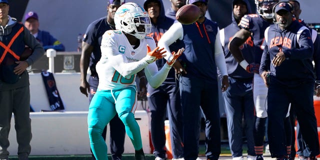 Miami Dolphins wide receiver Tyreek Hill catches a pass during the first half of an NFL football game against the Chicago Bears, Sunday, Nov. 6, 2022 in Chicago. 