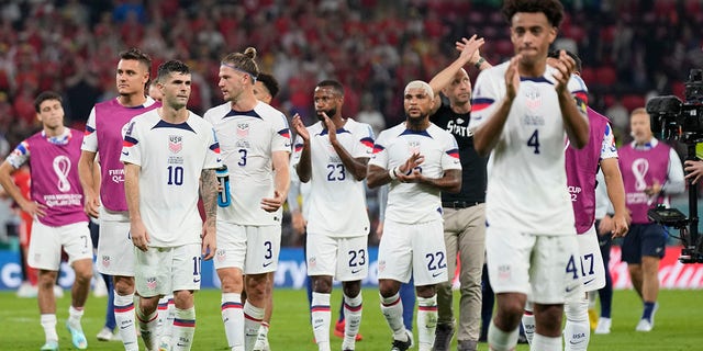 American players leave the pitch after the World Cup, group B soccer match between the United States and Wales, at the Ahmad Bin Ali Stadium in in Doha, Qatar, Monday, Nov. 21, 2022. 