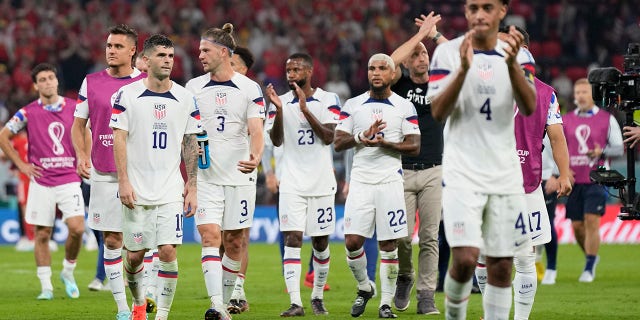 American players leave the pitch after the World Cup, group B soccer match between the United States and Wales, at the Ahmad Bin Ali Stadium in in Doha, Qatar, Monday, Nov. 21, 2022.