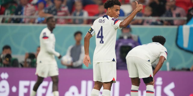 Tyler Adams (4) of the United States acknowledges the coaches during a FIFA World Cup Qatar 2022 Group B match against Wales at Ahmad Bin Ali Stadium on November 21, 2022 in Doha, Qatar.