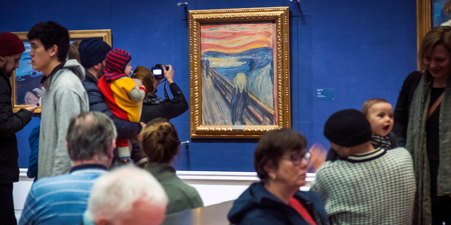 People watch by Edvard Munch "The scream" at the National Gallery in Oslo, Norway, Sunday 13 January 2019. On Friday 11 November 2022, activists from the organization '' Stopp oljeletinga '' (Stop Oil Exploration) tried to glue themselves to the frame of the painting. 