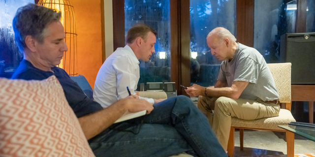 President Biden, right, talks on the phone with Polish President Andrzej Duda following an attack that killed two people in the eastern part of Poland near the Ukraine border as White House national security adviser Jake Sullivan, center, and Secretary of State Antony Blinken listen on Nov 16, 2022.