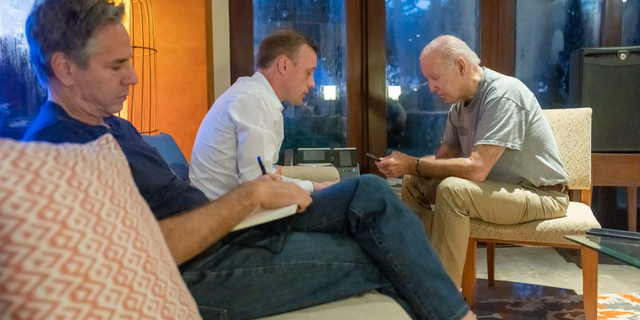 President Biden, right, talks on the phone with Polish President Andrzej Duda following an attack that killed two people in the eastern part of Poland near the Ukraine border as White House national security adviser Jake Sullivan, center, and Secretary of State Antony Blinken listen on Nov. 16, 2022.