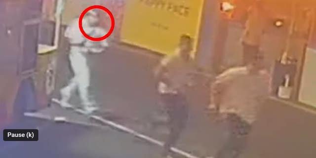 Brandon Manyo Dixon is seen chasing two British tourists in Los Angeles' Venice Beach neighborhood before shooting them, police said.