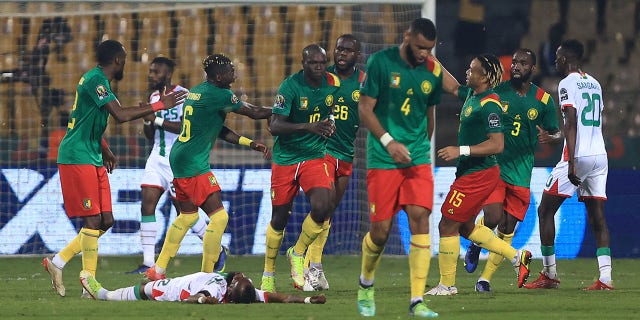 Cameroon's forward Vincent Aboubakar (3rdL) celebrates with teammates after scoring during the Africa Cup of Nations (CAN) 2021 third-place football match between Burkina Faso and Cameroon at Stade Ahmadou-Ahidjo in Yaounde on February 5, 2022.