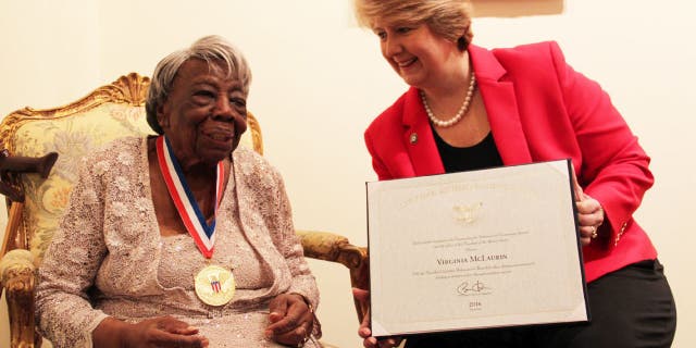 Wendy Spencer, CEO of the Corporation for National and Community Service, presented Virginia McLaurin, a senior corps volunteer, with the President's Volunteer Service Award for Lifetime Achievement in March 2016.