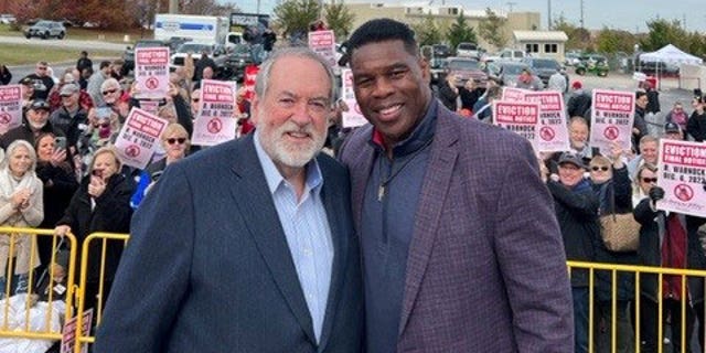 Former Republican Arkansas Gov. Mike Huckabee campaigned with Republican Georgia Senate nominee Herschel Walker on November 16, 2022 in McDonough, Georgia.