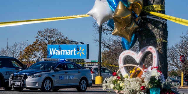 A memorial is seen at the site of a fatal shooting in a Walmart on Nov. 23, 2022, in Chesapeake, Virginia. 