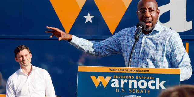 Sen. Raphael Warnock, D-Ga., speaks at a campaign event in Clarkston, Georgia, on Nov. 3, 2022.