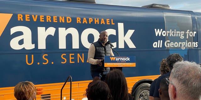 Democratic Georgia Sen. Raphael Warnock speaks to supporters at a campaign rally in Tifton, Georgia on November 29, 2022.