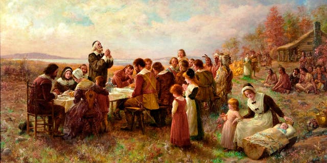 The first Thanksgiving in Plymouth in 1621, painting from 1914.  Private collection.  Artist Brownscombe, Jennie Augusta (1850-1936). 